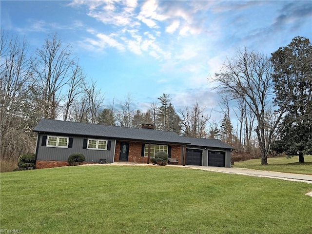 single story home featuring a garage and a front lawn