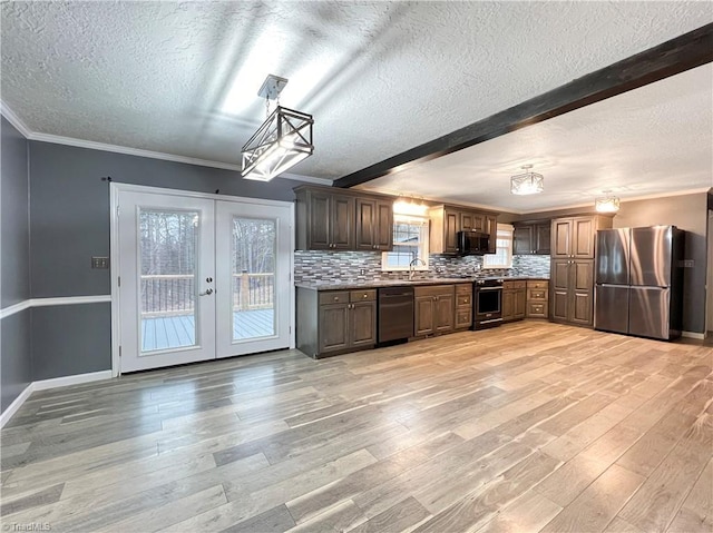 kitchen with beam ceiling, appliances with stainless steel finishes, french doors, decorative backsplash, and dark brown cabinets