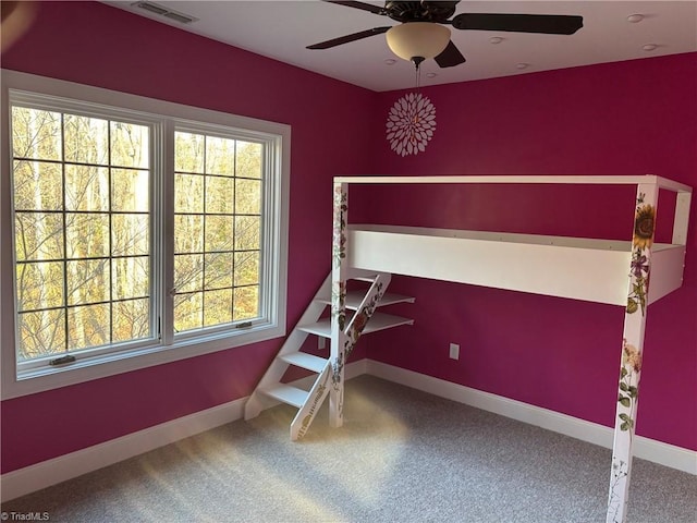 unfurnished bedroom with ceiling fan