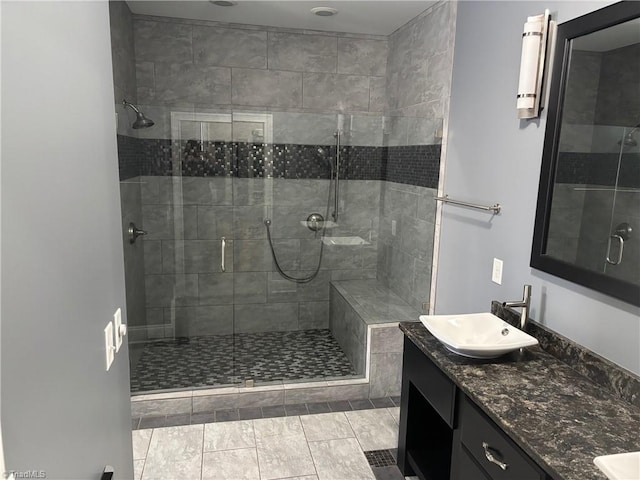 bathroom with vanity and walk in shower