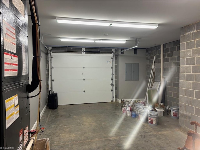 garage with electric panel and heating unit