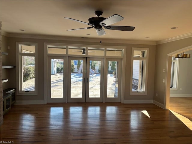 entryway with french doors, ceiling fan, ornamental molding, and dark hardwood / wood-style flooring