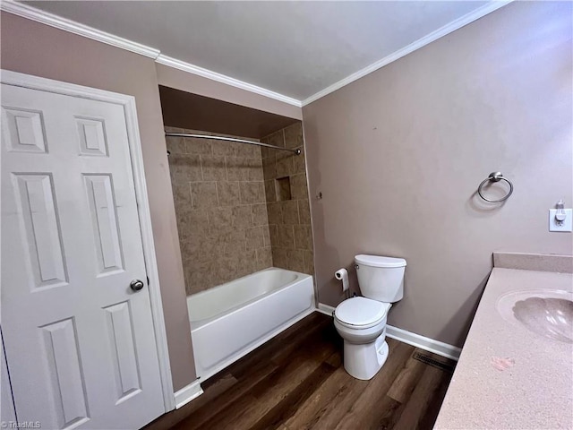 5608 Fred Lineberry Rd, Randleman, NC 27317 - bathroom with toilet, vanity, wood finished floors, baseboards, and shower / tub combination