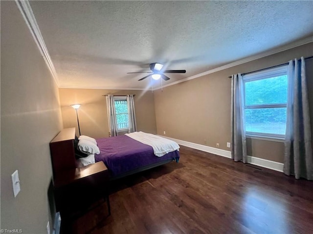 5608 Fred Lineberry Rd, Randleman, NC 27317 - bedroom featuring crown molding, wood finished floors, a textured ceiling, baseboards, and a ceiling fan
