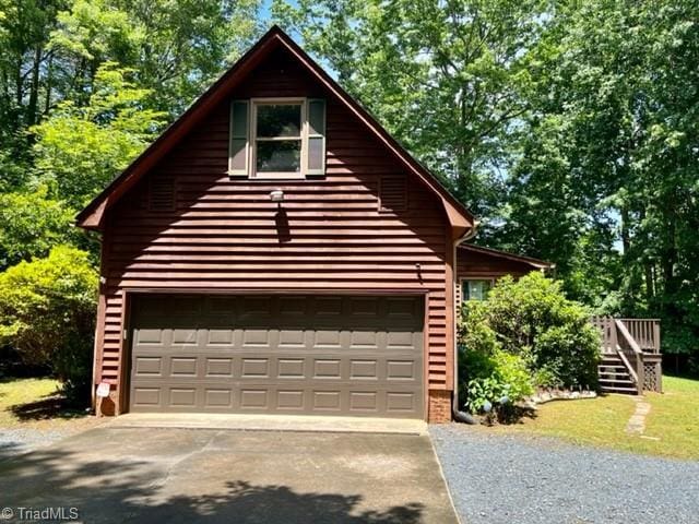 5608 Fred Lineberry Rd, Randleman, NC 27317 - view of side of property featuring concrete driveway and a garage