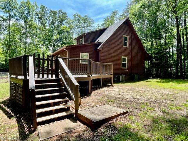 5608 Fred Lineberry Rd, Randleman, NC 27317 - back of house with a deck, stairs, and central AC unit