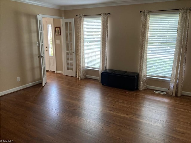 3908 Sandlewood Rd, High Point, NC 27265 - spare room featuring crown molding, wood finished floors, and french doors