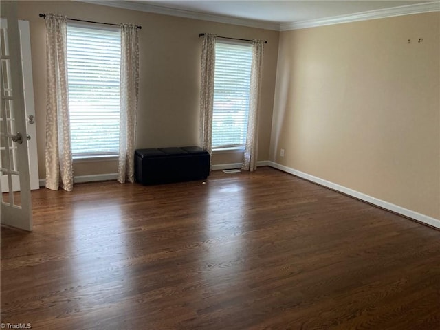 3908 Sandlewood Rd, High Point, NC 27265 - empty room featuring crown molding, healthy amount of natural light, and dark wood-style floors