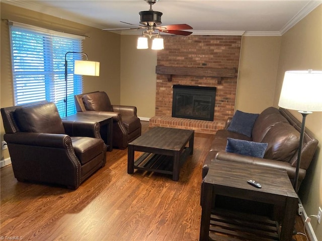 3908 Sandlewood Rd, High Point, NC 27265 - living room with a ceiling fan, wood finished floors, ornamental molding, and a fireplace