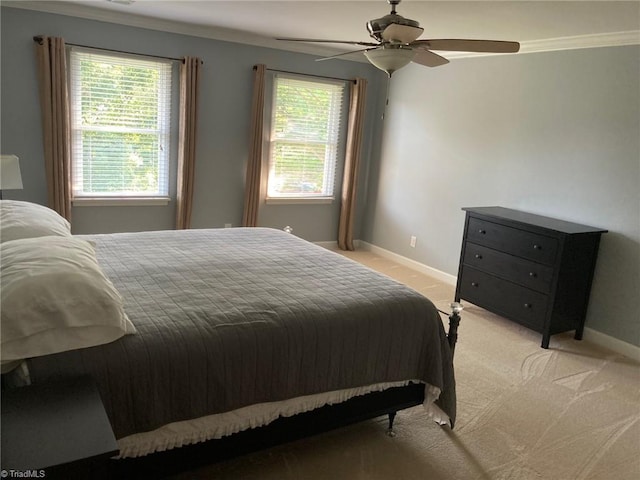 3908 Sandlewood Rd, High Point, NC 27265 - bedroom featuring light carpet, crown molding, and a ceiling fan