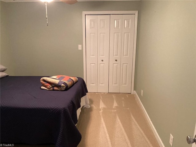 3908 Sandlewood Rd, High Point, NC 27265 - carpeted bedroom with a closet and a ceiling fan