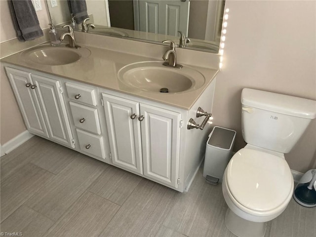 3908 Sandlewood Rd, High Point, NC 27265 - bathroom featuring double vanity and toilet