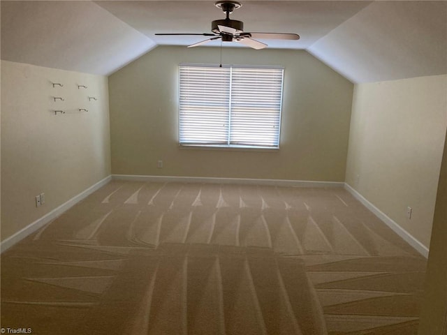 3908 Sandlewood Rd, High Point, NC 27265 - additional living space featuring a ceiling fan, vaulted ceiling, and light carpet