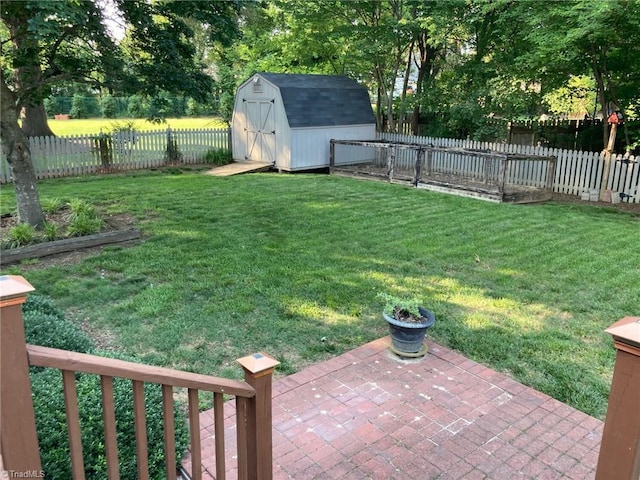 3908 Sandlewood Rd, High Point, NC 27265 - fenced backyard with a storage shed and a patio