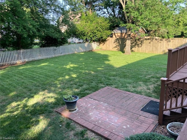 3908 Sandlewood Rd, High Point, NC 27265 - fenced backyard featuring a patio area