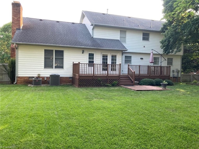 3908 Sandlewood Rd, High Point, NC 27265 - rear view of property featuring a wooden deck, a chimney, and a shingled roof