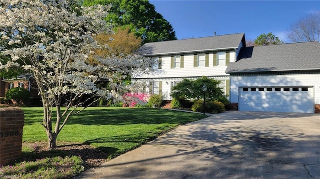 3908 Sandlewood Rd, High Point, NC 27265 - colonial-style house featuring driveway and a front lawn