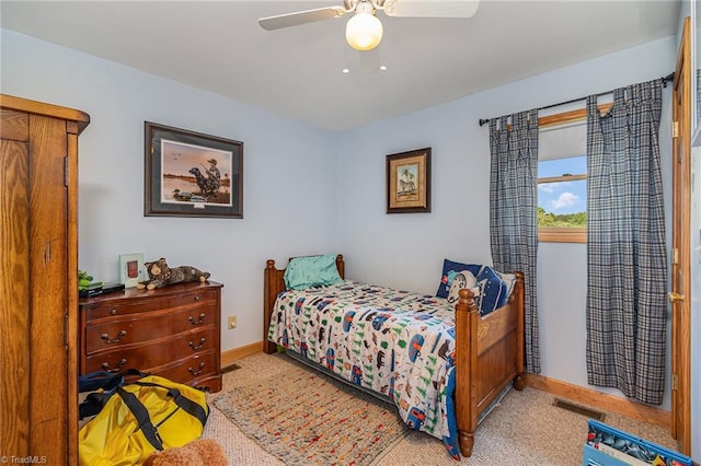 bedroom featuring ceiling fan and light colored carpet