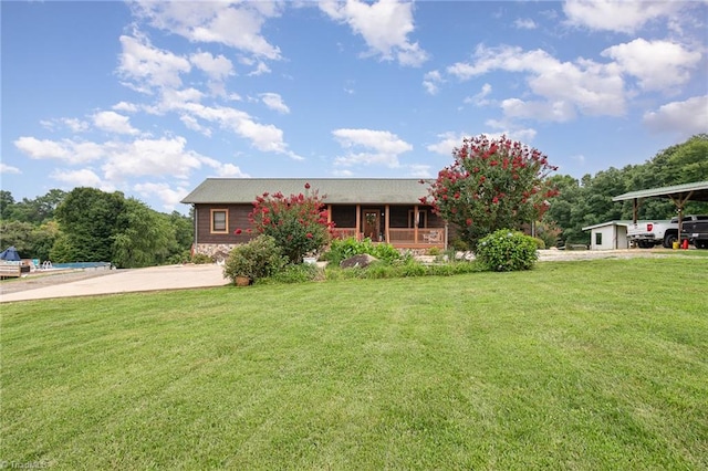 view of front of property with covered porch and a front yard