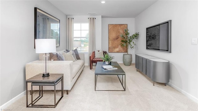 living room featuring light colored carpet