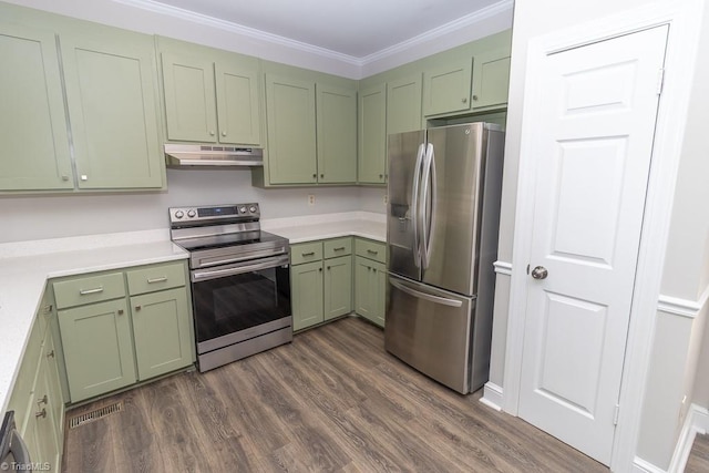 kitchen featuring light countertops, dark wood finished floors, stainless steel appliances, under cabinet range hood, and green cabinets