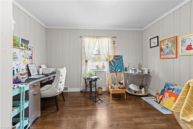 home office featuring crown molding, baseboards, and wood finished floors