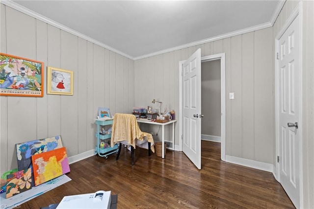 office featuring ornamental molding, baseboards, and wood finished floors