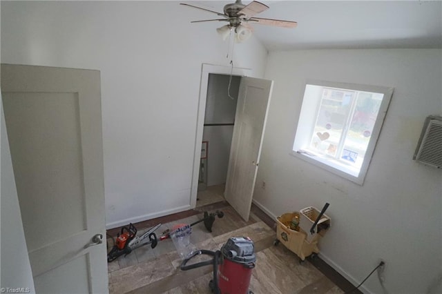 unfurnished bedroom with lofted ceiling and ceiling fan