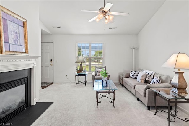 3207 Stavanger Ct, Winston-Salem, NC 27127 - living room featuring carpet floors, ceiling fan, a fireplace with flush hearth, and vaulted ceiling