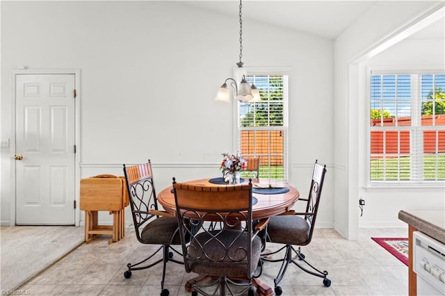 3207 Stavanger Ct, Winston-Salem, NC 27127 - dining area featuring healthy amount of natural light, vaulted ceiling, and light tile patterned floors