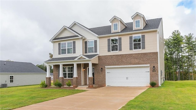 577 Tobacco Rd, Lexington, NC 27295 - craftsman house featuring central AC, a garage, covered porch, and a front yard