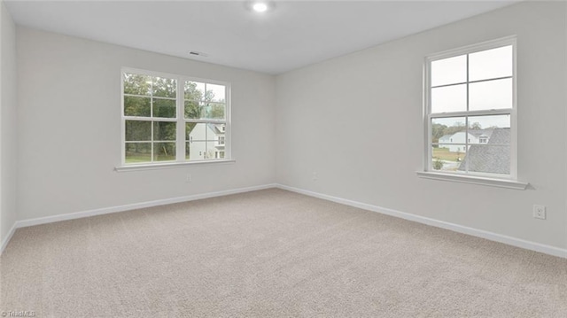 view of carpeted spare room