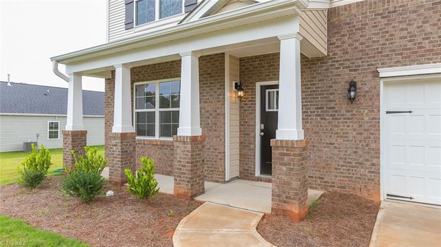 property entrance with central AC and covered porch