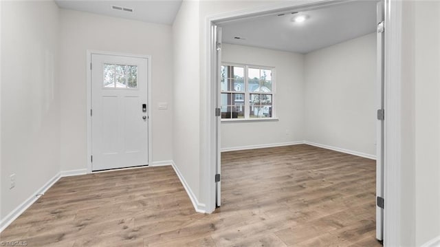 foyer entrance featuring light wood-type flooring