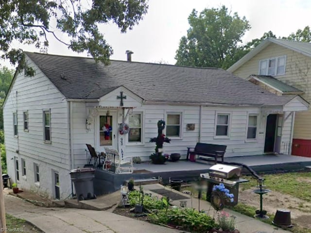 view of front facade with a patio area