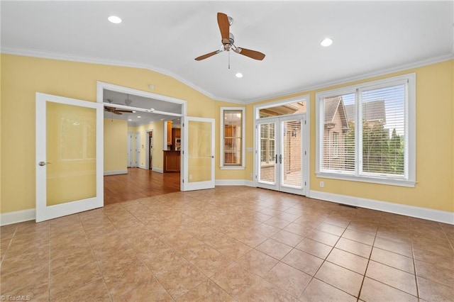 1010 Mill Pointe Way, Elon, NC 27244 - spare room featuring french doors, ornamental molding, lofted ceiling, a ceiling fan, and tile patterned floors