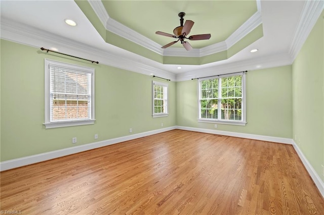 1010 Mill Pointe Way, Elon, NC 27244 - unfurnished room with ornamental molding, a tray ceiling, light wood-style flooring, a ceiling fan, and recessed lighting