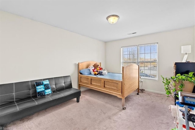 bedroom featuring carpet flooring