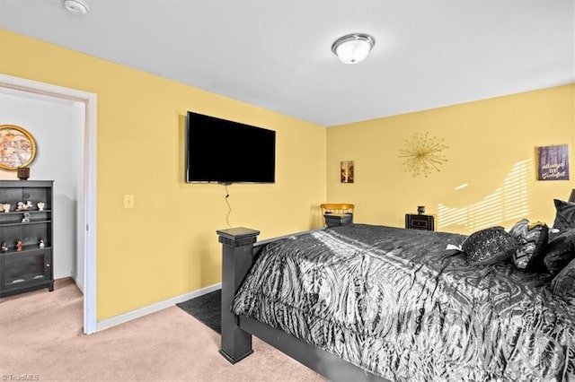 bedroom with light colored carpet