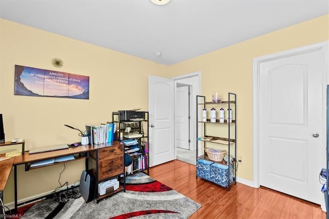 office area with hardwood / wood-style flooring