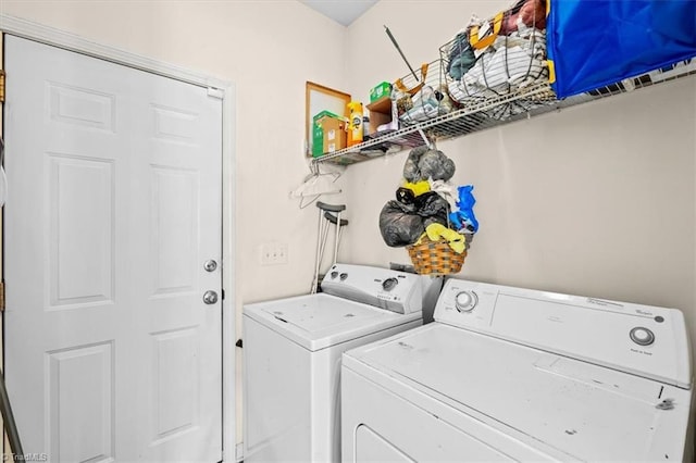 laundry area featuring washing machine and dryer