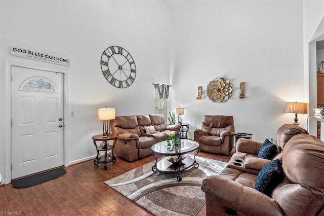 living room with dark wood-type flooring