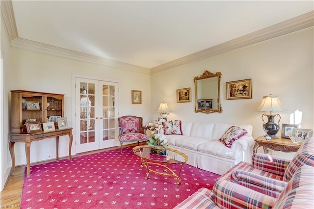 living area with french doors, wood finished floors, and ornamental molding