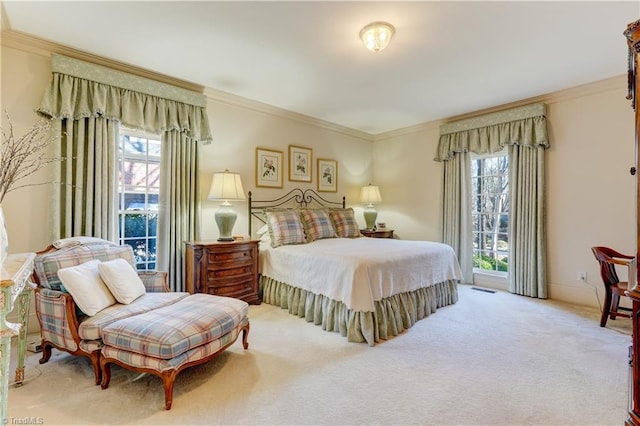 bedroom featuring carpet floors and ornamental molding