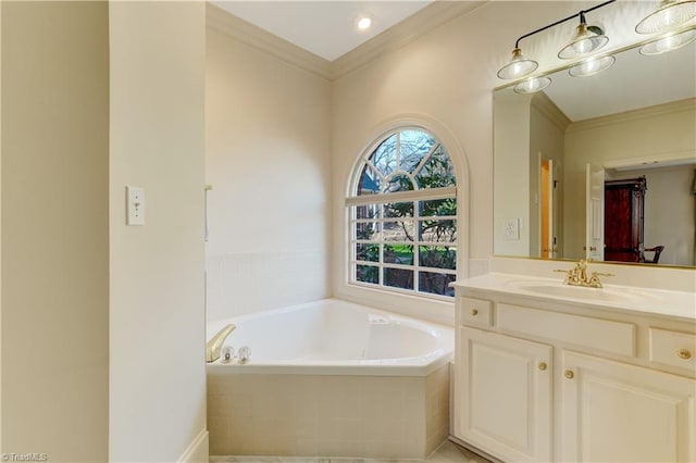 full bath featuring vanity, crown molding, and a bath