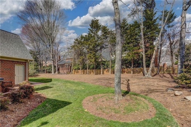 view of yard with fence