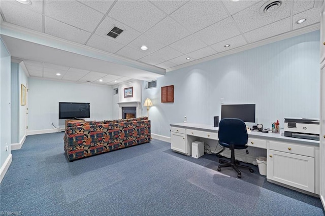 office featuring crown molding, baseboards, and visible vents