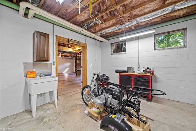 basement with concrete block wall