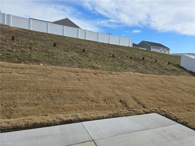 view of yard featuring fence