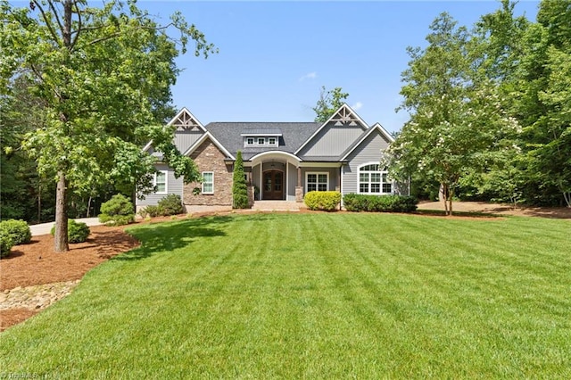 3922 Tam O Shanter Rd, Kernersville, NC 27284 - craftsman house with a front lawn and board and batten siding